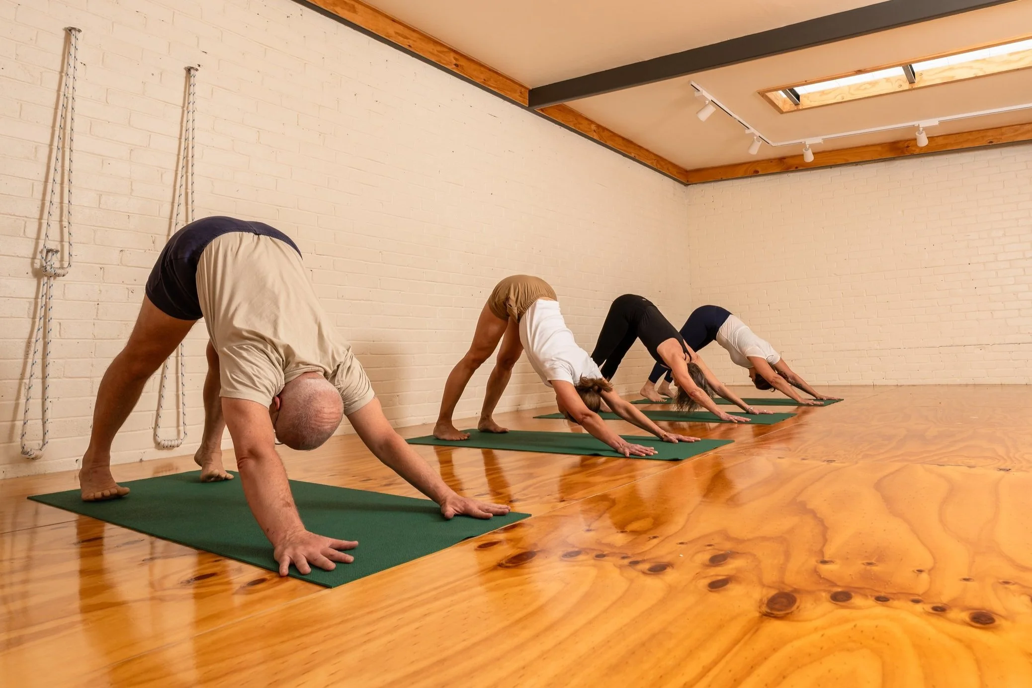 Yoga practitioner resting in a peaceful restorative pose
