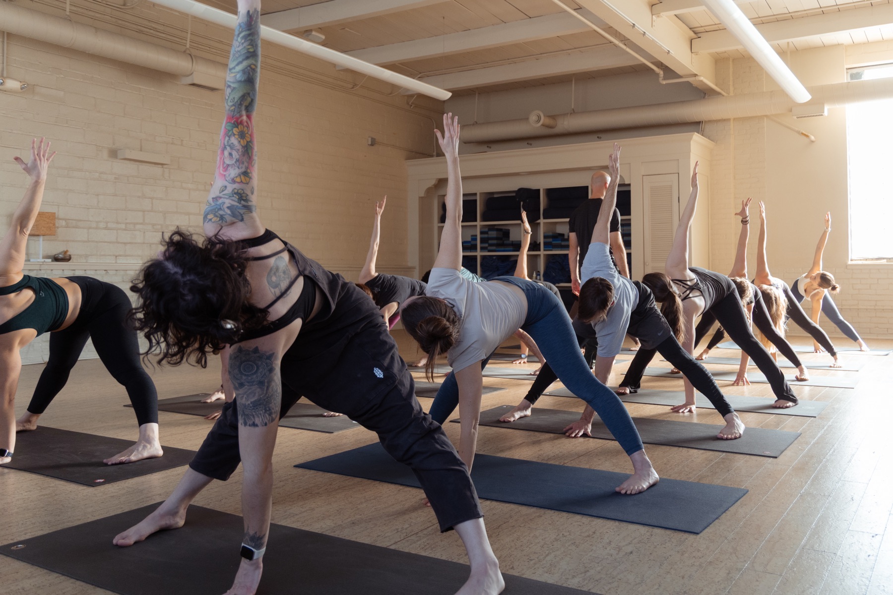 Yoga practitioner practicing a mindful seated pose in a peaceful studio